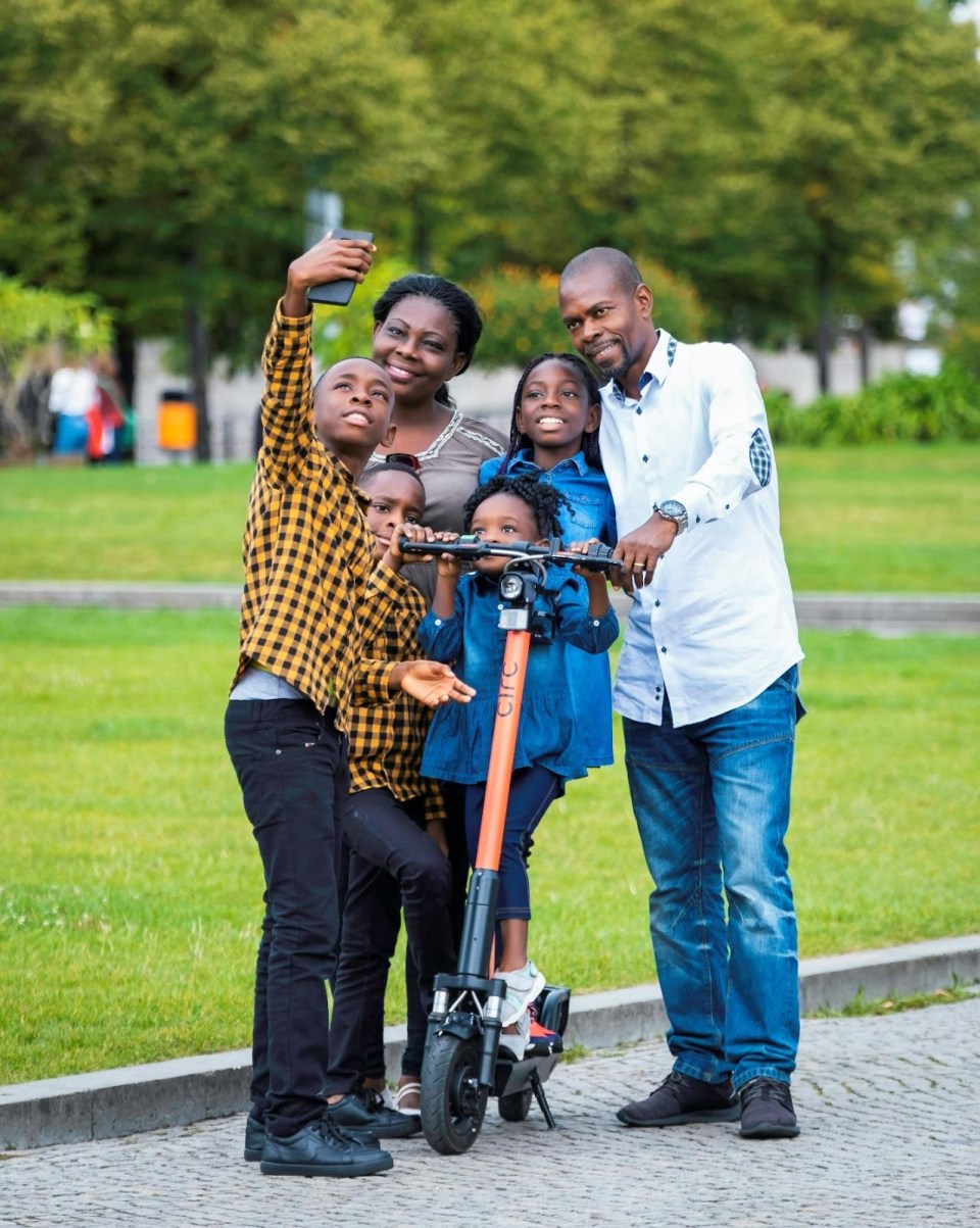 Resilience, not perfection: 3 tips to parent through pressure without losing yourself Happy african american family outdoors embracing resilience not perfection in parenting for an article about resilience, not perfection: 3 tips to parent through pressure without losing yourself