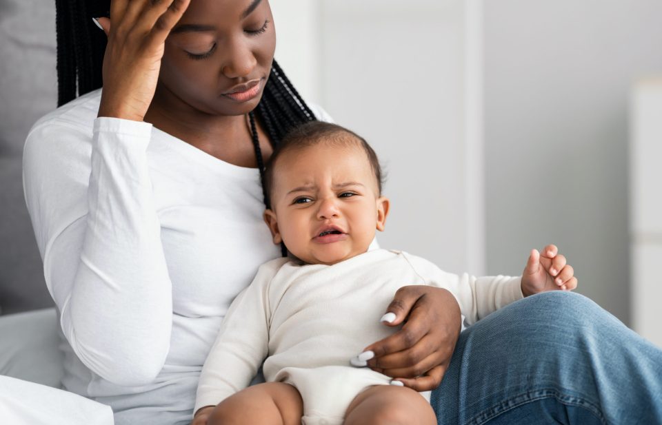 Postpartum and black motherhood Adobestock 421028188 scaled on successful black parenting magazine