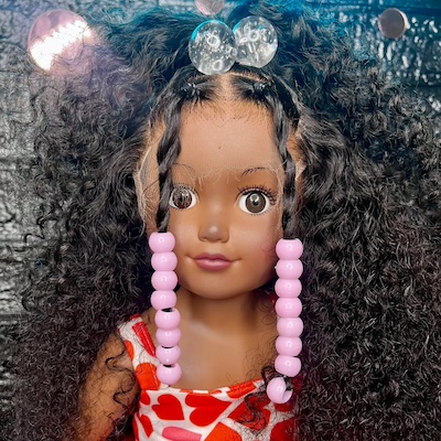 The ultimate holiday gift guide for kids: supporting black-owned businesses Custom doll wigs on successful black parenting magazine