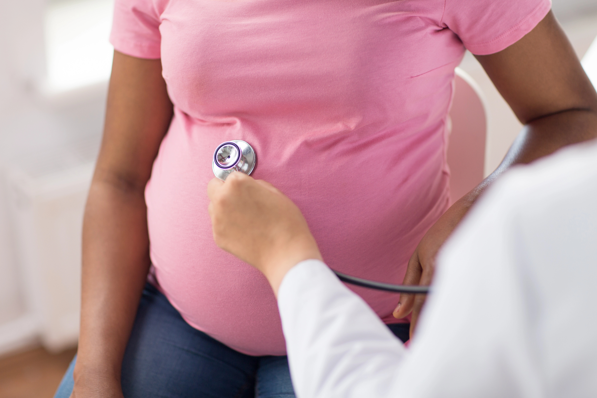 Understanding birth injuries in black families: awareness and support A pregnant african american woman getting an exam for understanding birth injuries in black families: awareness and support