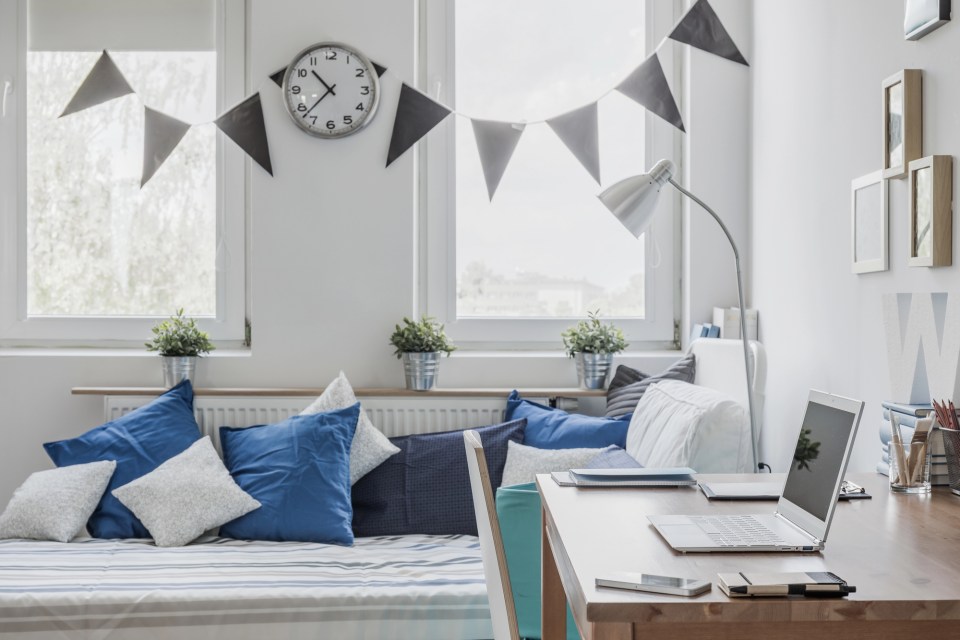 How to create a positive learning environment at home A positive learning environment for a student in their bedroom at their home.