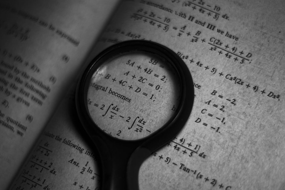 Child struggling with math? 12 signs and 7 ways to help Chalkboard with math formulas representing learning difficulties and abstract math concepts