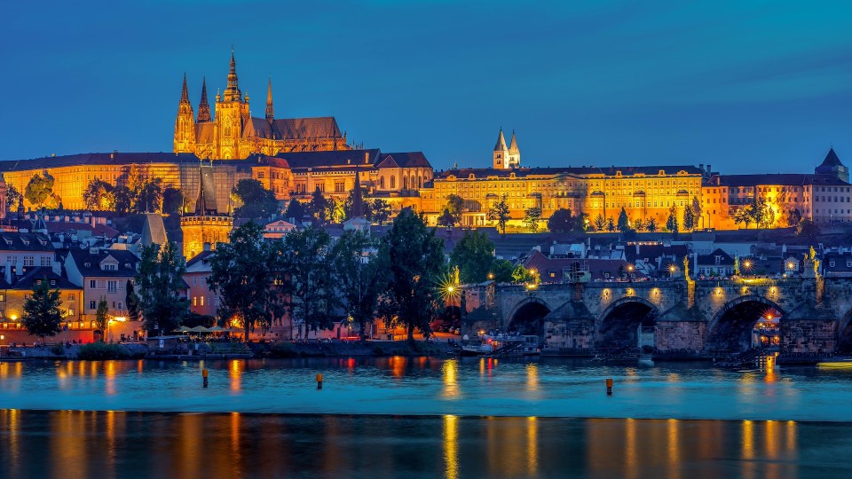 10 breathtaking family-friendly travel destinations worldwide The historic prague castle in czechoslovakia, a fairy-tale setting for family trips.