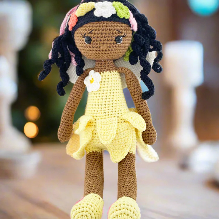 The ultimate holiday gift guide for kids: supporting black-owned businesses Yellow fairy sitting 1080x copy on successful black parenting magazine