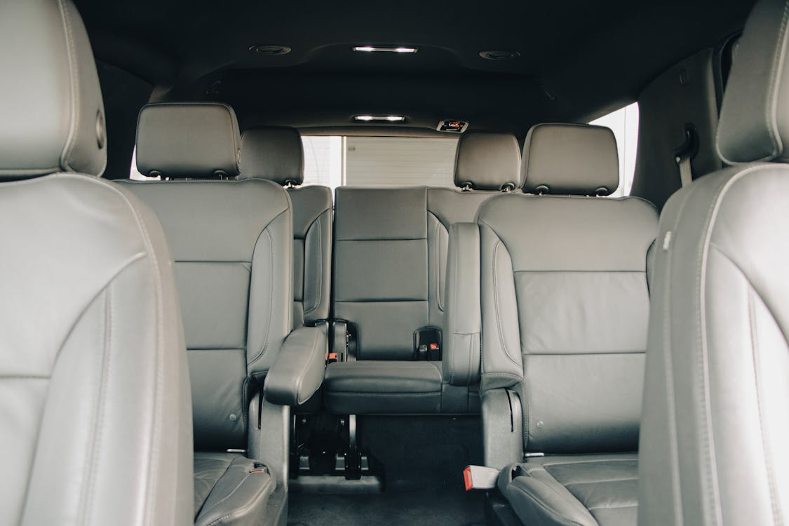 The 7 best airport car services in washington, dc Inside of a large suv wiht grey leather interior - the 7 best airport car services in washington, dc