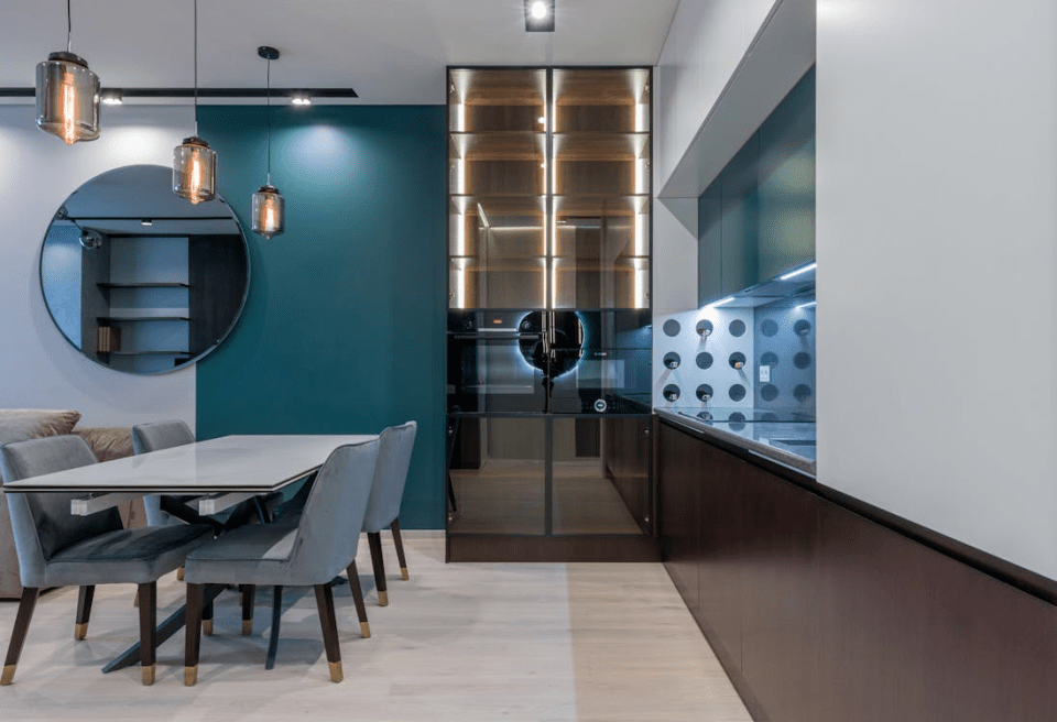 How to create a home wine cellar Modern kitchen with integrated home wine cellar and glass racking system for a story on how to create a home wine cellar